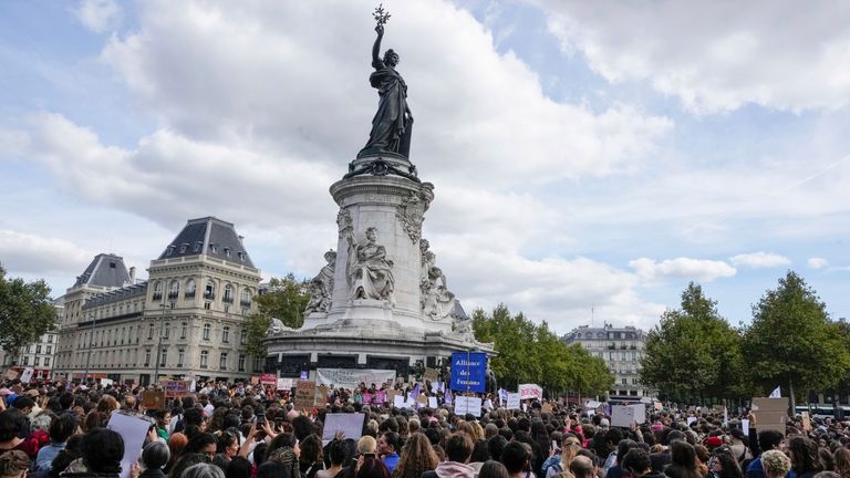 People take part in a gathering at Place de la Rebublique in support of 71-year-old Gisele Pelicot who was allegedly drugged by her ex-husband and raped by dozens of men while unconscious, Saturday, Sept. 14, 2024 in Paris. (AP Photo/Michel Euler)