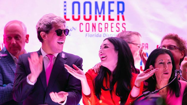 Republican congressional candidate Laura Loomer celebrates with Milo Yiannopoulos (left) and campaign director Karen Giorno (right) at an election night event at the airport Hilton in West Palm Beach, August 18, 2020. Loomer is one of five GOP candidates hoping to secure the nomination in the primary on Aug. 18. The winner will challenge the winner of Democratic primary between incumbent U.S. Rep. Lois Frankel and Guido Weiss in the November general election. [ALLEN EYESTONE/palmbeachpost.com]